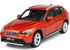 Orange / Black 1:18 Scale Kyosho Diecast BMW X1 Model