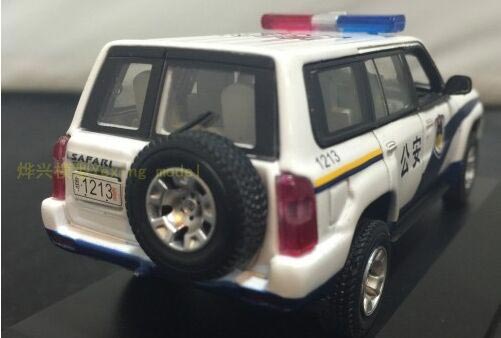 067 Nissan Patrol 1992 police 1 43