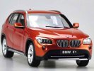 Orange / Black 1:18 Scale Kyosho Diecast BMW X1 Model