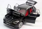 Orange / Black 1:18 Scale Kyosho Diecast BMW X1 Model