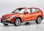 Orange / Black 1:18 Scale Kyosho Diecast BMW X1 Model