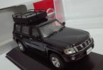 Black / Red 1:43 Baggage Carrier Diecast Nissan Patrol Model