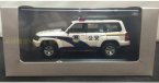 White 1:43 Scale Police Theme Diecast Nissan Patrol Model