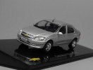 Silver 1:43 IXO Diecast 2012 Chevrolet Prisma Model